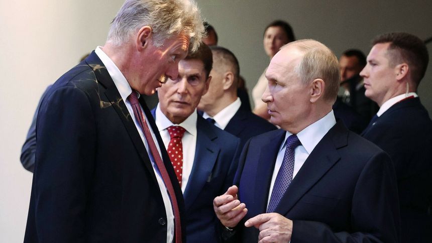 Dmitrij Pieskow i Władimir Putin