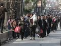 Mieszkańcy uciekają z kurdyjskiej dzielnicy Ashrafieh w Aleppo, 7 stycznia 2026 r.