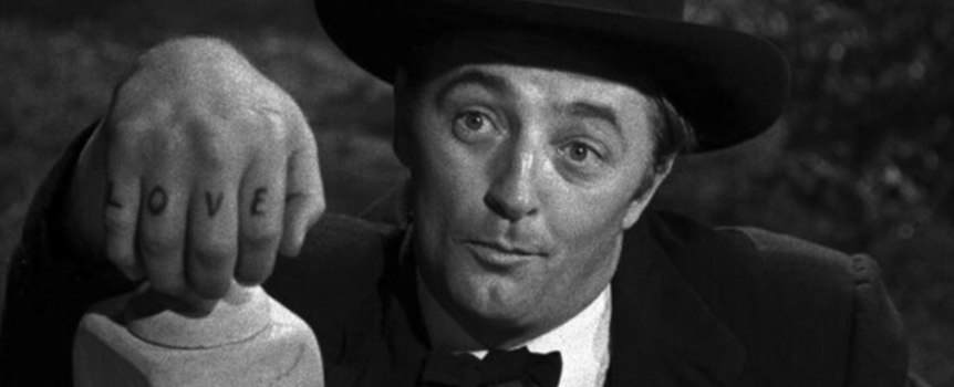 Robert Mitchum jako Henry Powell w filmie "Noc myśliwego"