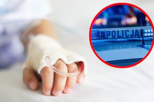 Rączka dziecka i radiowóz