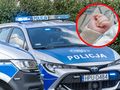 Radiowóz i rączka dziecka