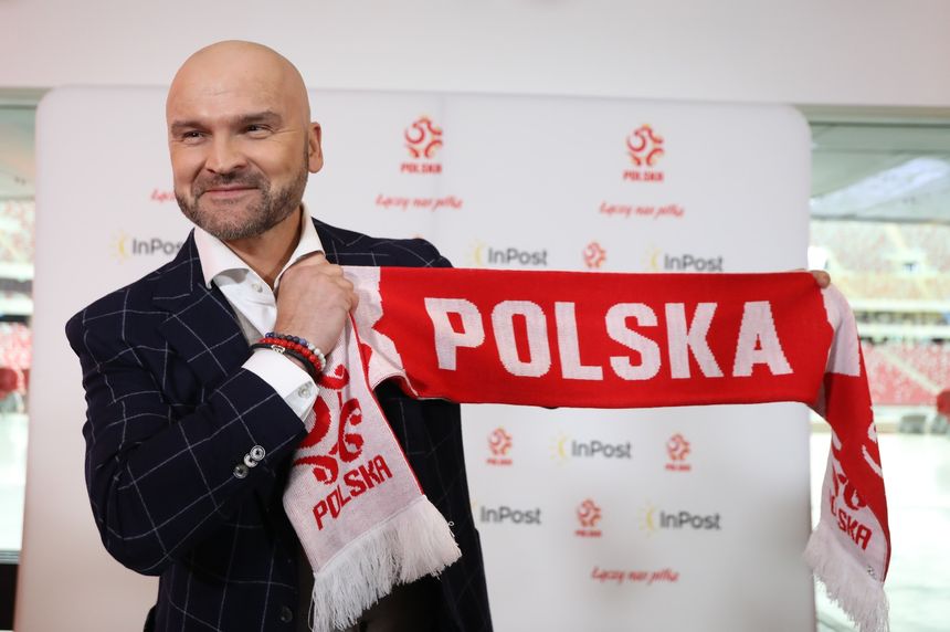 Rafał Brzoska z szalikiem Polska