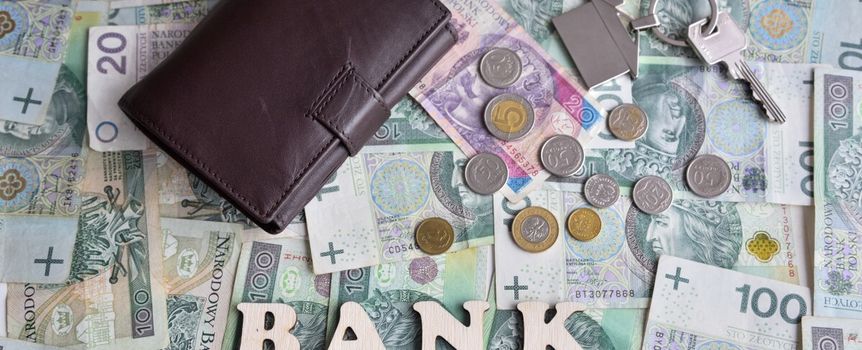 pieniądze, portfel i napis bank