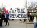 rolnicy na proteście z transparentem