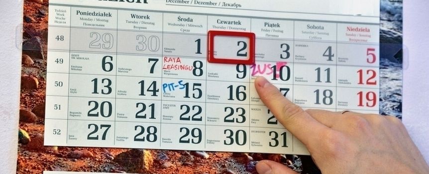 ręka na kalendarzu