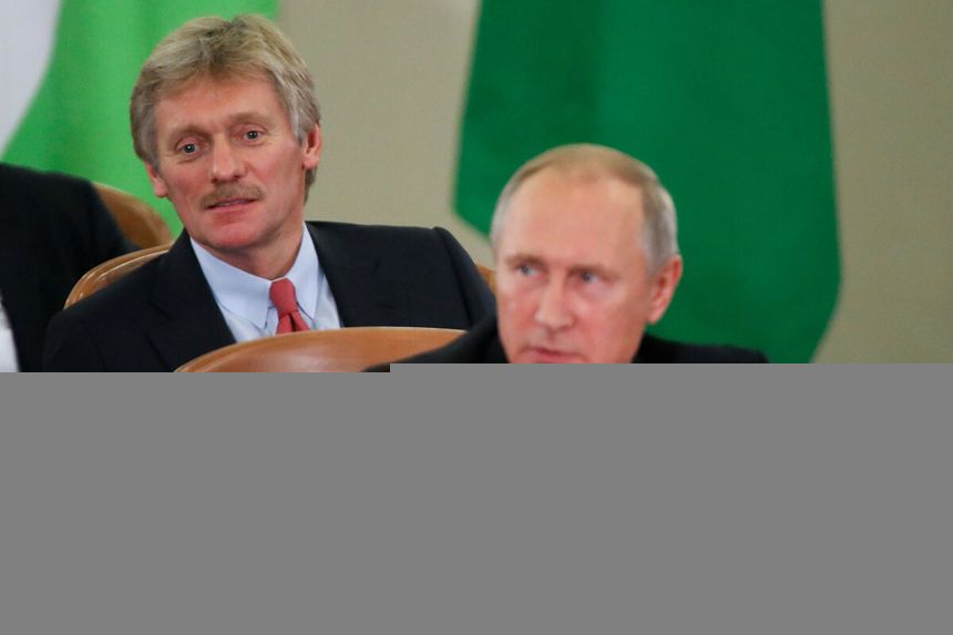Dmitrij Pieskow i Władimir Putin