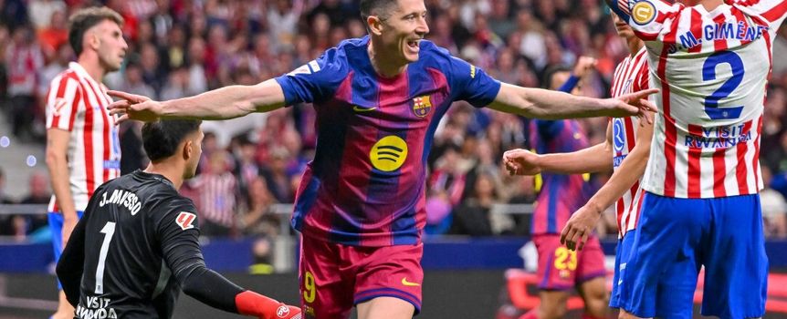 Robert Lewandowski celebrujący gola w meczu przeciwko Atletico Madryt.