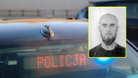 Radiowóz policyjny i wizerunek poszukiwanego listem gończym Gruzina
