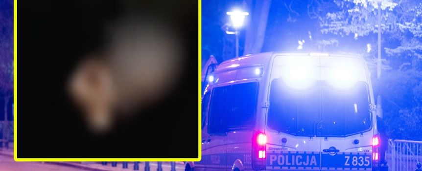 Na zdjęciu widoczny radiowóz policyjny na nocnej ulicy, w tle nieco zamazane kształty.