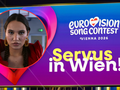Na zdjęciu kontur osoby w czerwonej sukni z napisem 