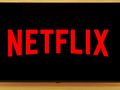 Ekran telewizora z logo Netflix w dużych czerwonych literach na czarnym tle.