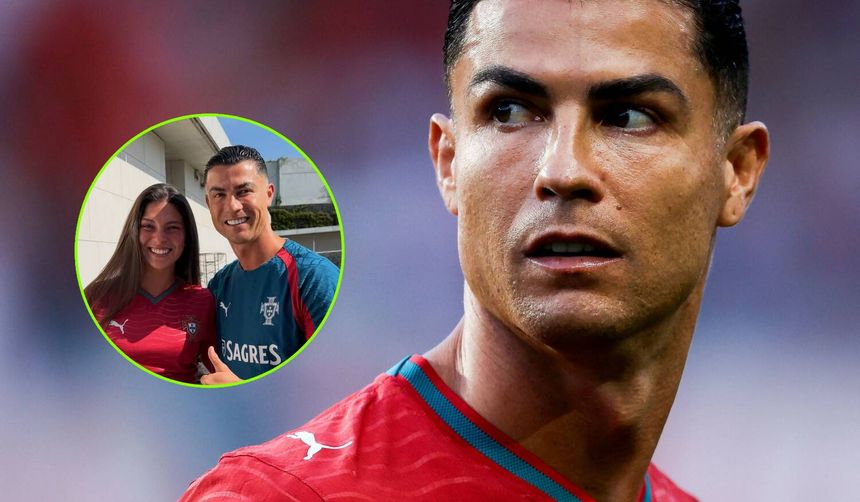 Cristiano Ronaldo w czerwonej koszulce, z uśmiechem pozujący z Celine Dept w koszulce reprezentacji Portugalii.