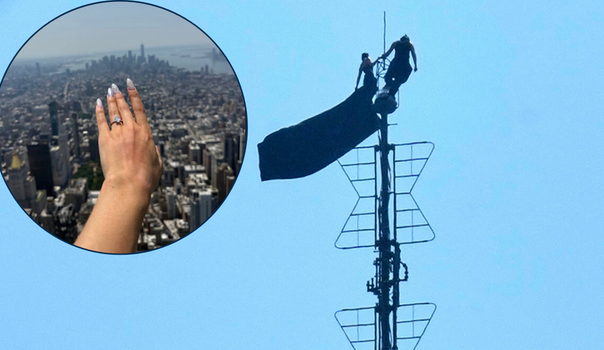 Zamaskowane osoby na iglicy Empire State Building, wywieszające czarny transparent