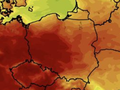 Mapa termiczna Polski z różnymi odcieniami czerwieni i żółci, wskazująca na temperatury.