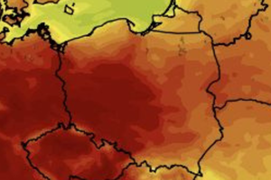 Mapa termiczna Polski z różnymi odcieniami czerwieni i żółci, wskazująca na temperatury.