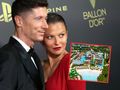 Na zdjęciu Robert Lewandowski z żoną Anną, w eleganckich strojach, na tle logo Ballon d'Or.