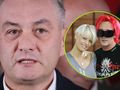 Na zdjęciu zbliżenie Roberta Biedronia, w tle rozmyte twarze innych osób.