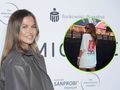 Anna Lewandowska w szarej kurtce, uśmiechnięta, pozująca na tle sceny z wydarzenia.