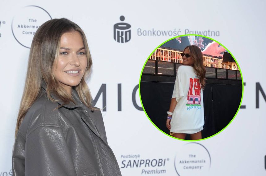 Anna Lewandowska w szarej kurtce, uśmiechnięta, pozująca na tle sceny z wydarzenia.