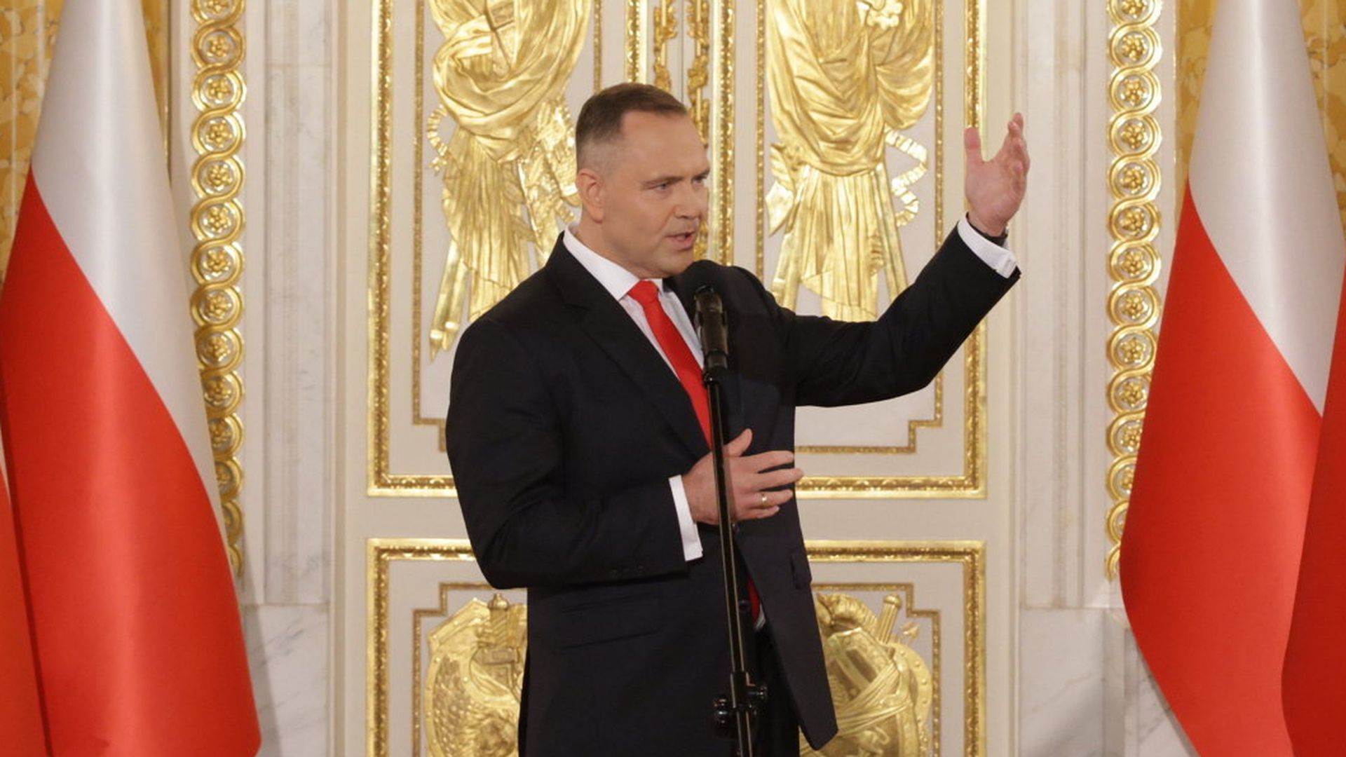 Karol Nawrocki podczas wystąpienia — fot. tokfm.pl