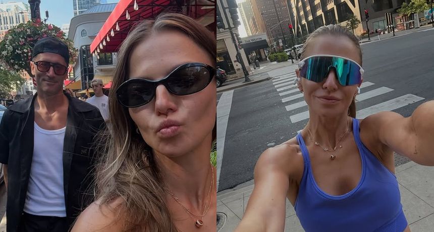 Anna Lewandowska robi selfie w mieście, w tle budynki i przechodnie.