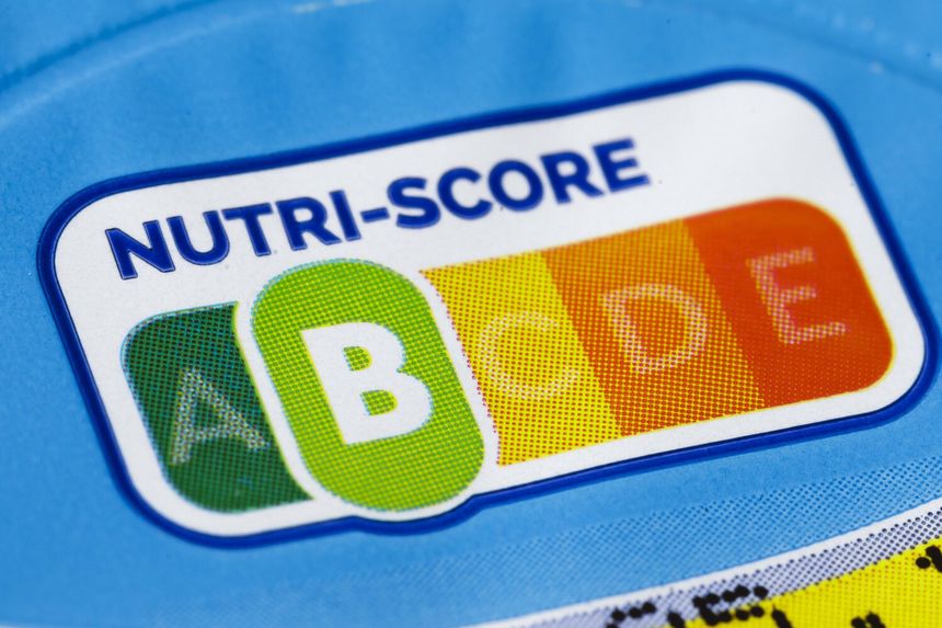 Logo Nutri-Score przedstawiające oceny A, B, C, D, E na niebieskim tle.