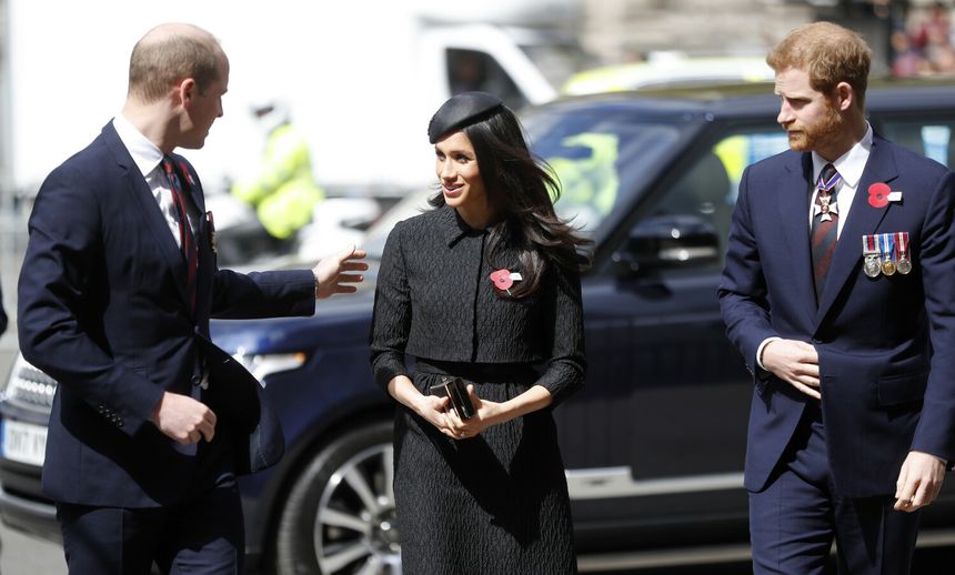 Książe William, księżna Meghan i książe Harry
