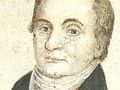 Obraz portretu mężczyzny w epoce historycznej, z wyraźnym kołnierzem i włosami.