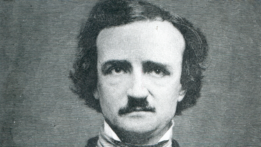 Portret mężczyzny z ciemnymi włosami i brodą.