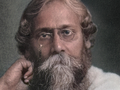 Rabindranath Tagore z siwą brodą i w okularach