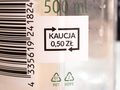 Etykieta butelki z kodem kreskowym, informacją o kaucji 0,50 zł i pojemności 500 ml.